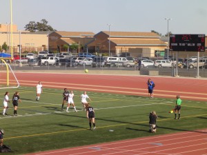A Franklin High player throws in the ball during Saturday's game.  Davis lost the section final game in penalty kicks.
