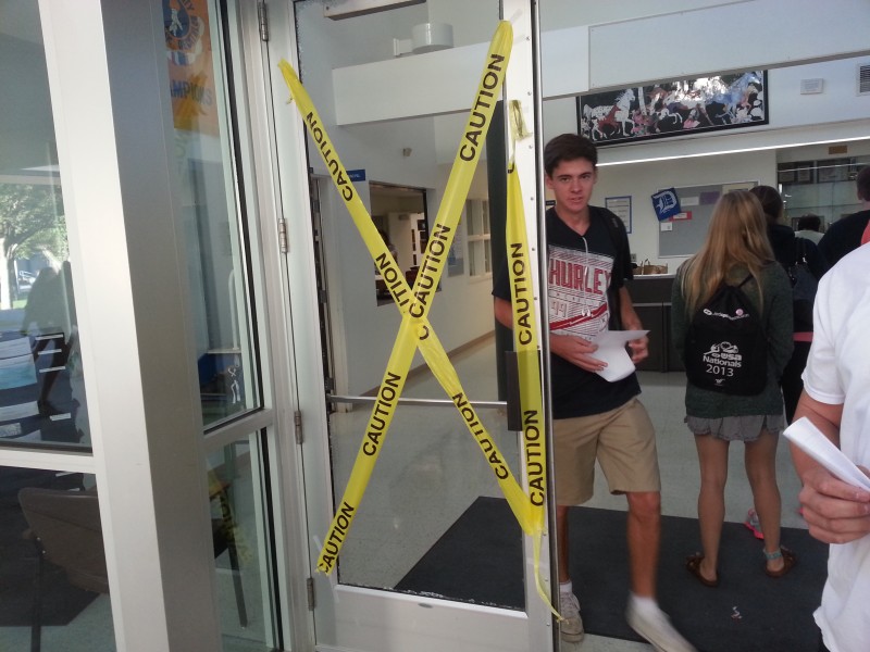 The main office door shattered on the first day of school. Photo by Skyler Blume.