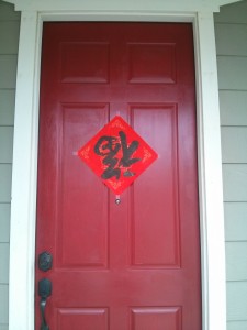 Jian and her family decorate their home by placing an upside down "fu" on their front door. Courtesy photo by Diana Jian. 