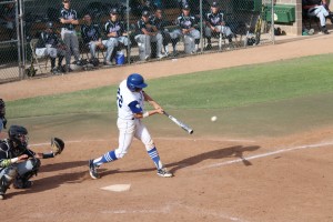 Senior John Ariola strokes a hit in today's contest against Franklin High School. The Blue Devils won the matchup 14-6, allowing them to advance on to the finals. 