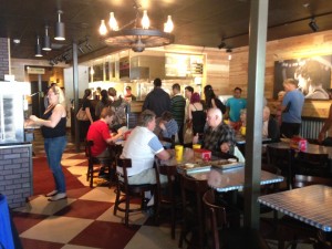 Customers wait in line to order their food at Dickey's Barbecue Pit. Dickey's specializes in southern-style meats and sandwiches. 