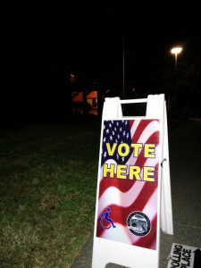 A sign in front of the Veterans Memorial Center marks the building as an official polling place.
