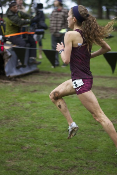 Fiona O'Keeffe races to a fourth place in the nation finish at the muddy Glendoveer Golf Course on Dec. 6. 