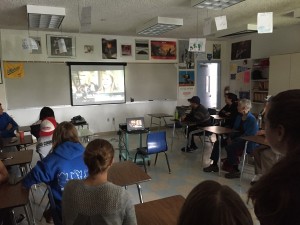 O'Keeffe's teammates, friends and family gather in L-25 to watch her race.