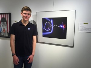 Da Vinci grad Justin McGrew participates in a Crocker Art Museum show. His self-portrait won an award for Excellence in Medium. Courtesy photo by Laili Matin McGrew. 