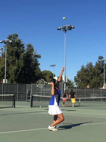 Junior Amy Fang gets ready for a serve in the Blue Devils’ 6-3 win against Pioneer.