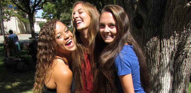 Senior Sarina Buchannan (left) poses with her friends Danielle Mentink (center) and Hannah Denton (right).