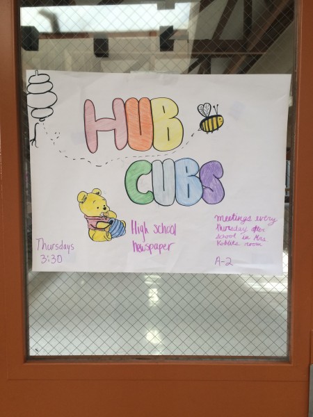 This advertisement for the club hangs on the door to the Emerson cafeteria. 