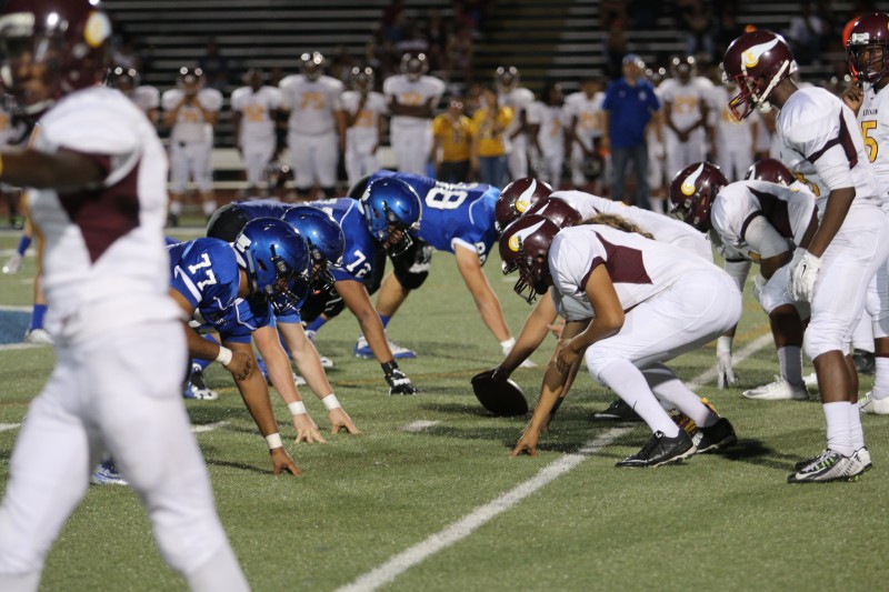 The Davis defenders line up to take down the Edison offense at the home game on Sept. 18. (Photo by E Tuttle)