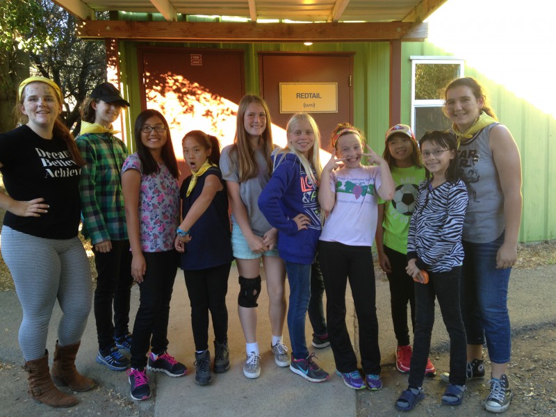 Mackenna Herzog and Sabreen Rashmawi, co-cabin leaders for the sixth grade Pioneer Walker Creek Ranch trip, pose with their campers at Walker Creek. (courtesy photo from Mackenna  Herzog)