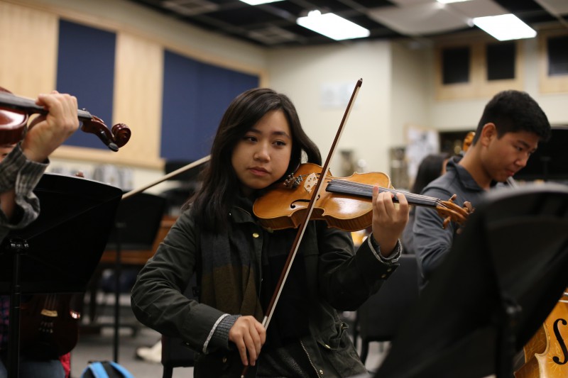 Rebecca Chang practices her violin.
