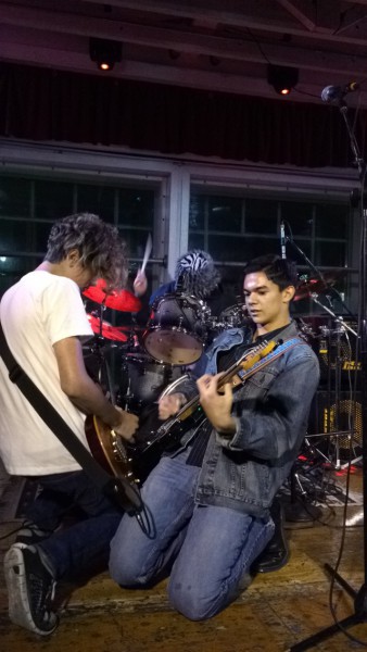 Carson Janke and Nathan Warhover fall to their knees on stage during Battle of the Bands competition San Francisco. 