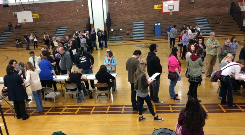 Voters wait to register in the Sparks High School gym. Due to a system glitch, many had to re-register to vote on the morning of the caucus.