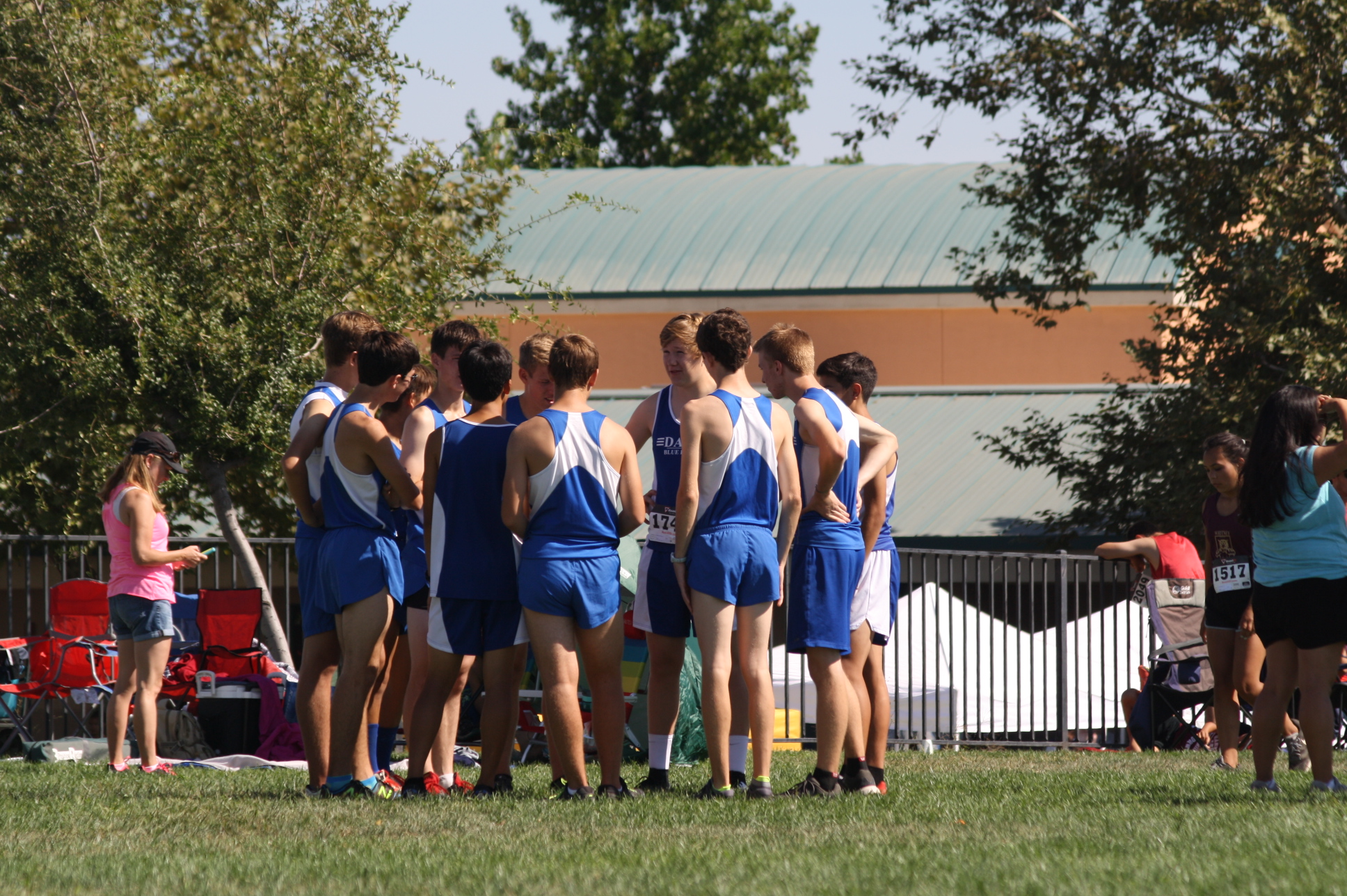 The JV men get a pep talk from junior Will Wyman before the race.