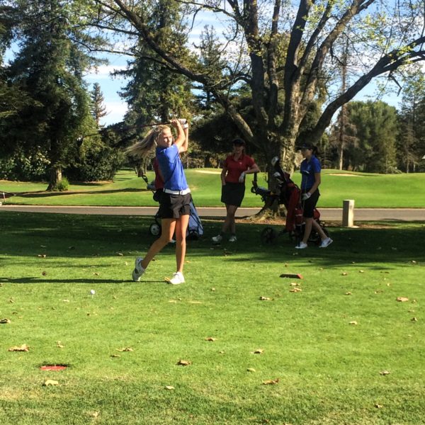 Junior McKenna Chupka tees off on the first hole at El Macero Country Club.