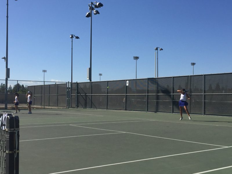 Junior Nancy Avoce hits a forehand in the Davis’ 8-1 win over Pleasant Grove.