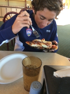 Jake Taylor demonstrates how to properly use a fork. Taylor has been instructed in proper manners from a young age.