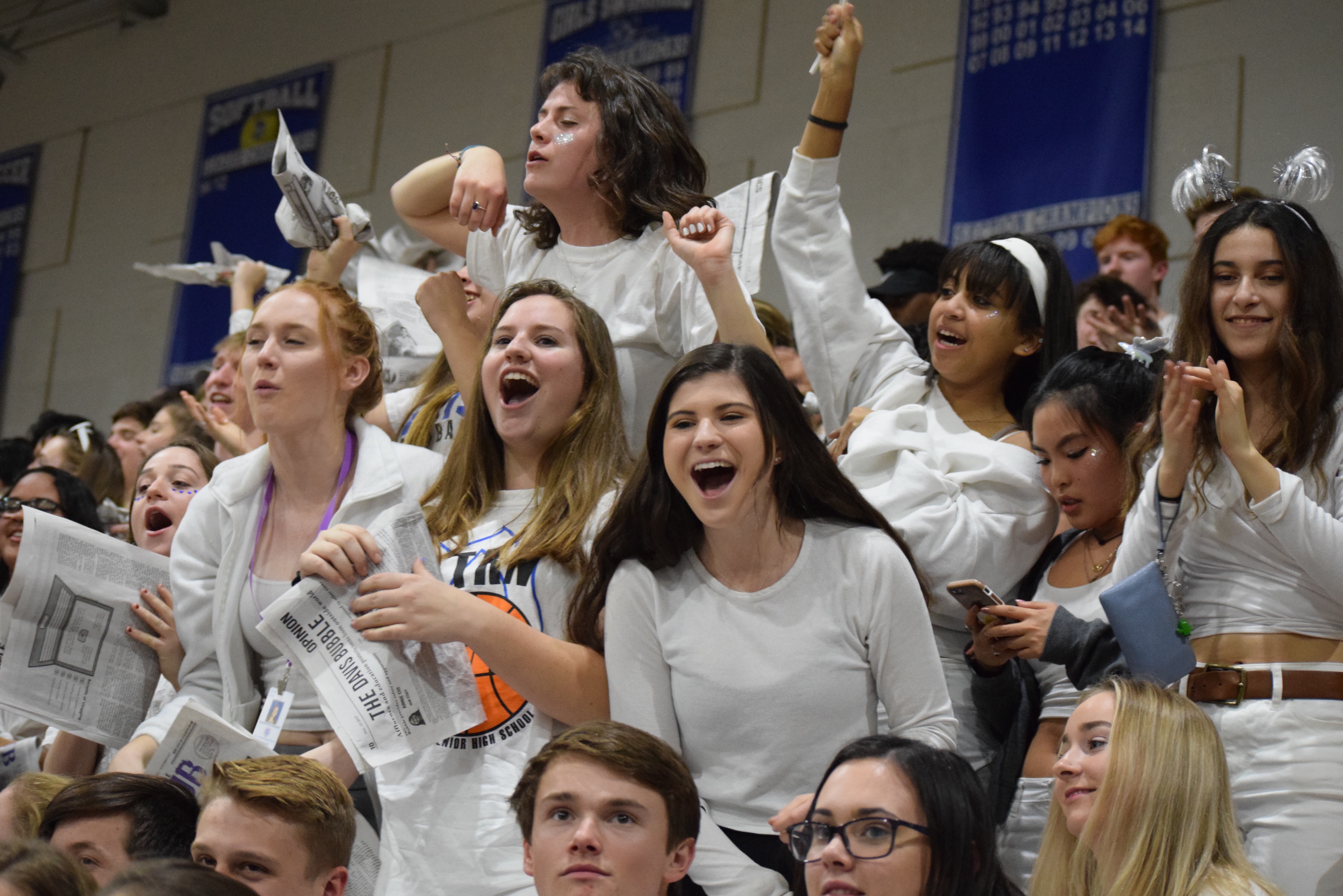 Fans decked out in white cheer from the sidelines. Senior Rayan Tilmatine made addressed fans before the first whistle, asking them to be courteous to the  players and officials on the court.