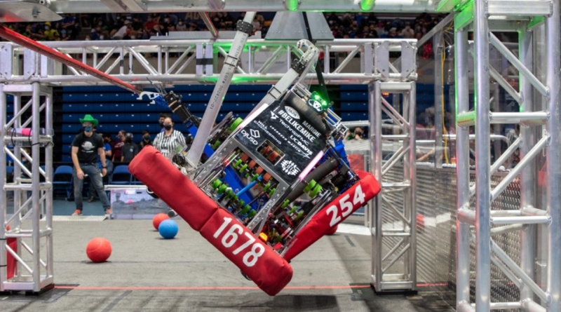 robot climbing across metal bars